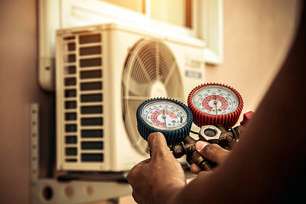 Professional Heat Pump Repair technician working in West Park, NY